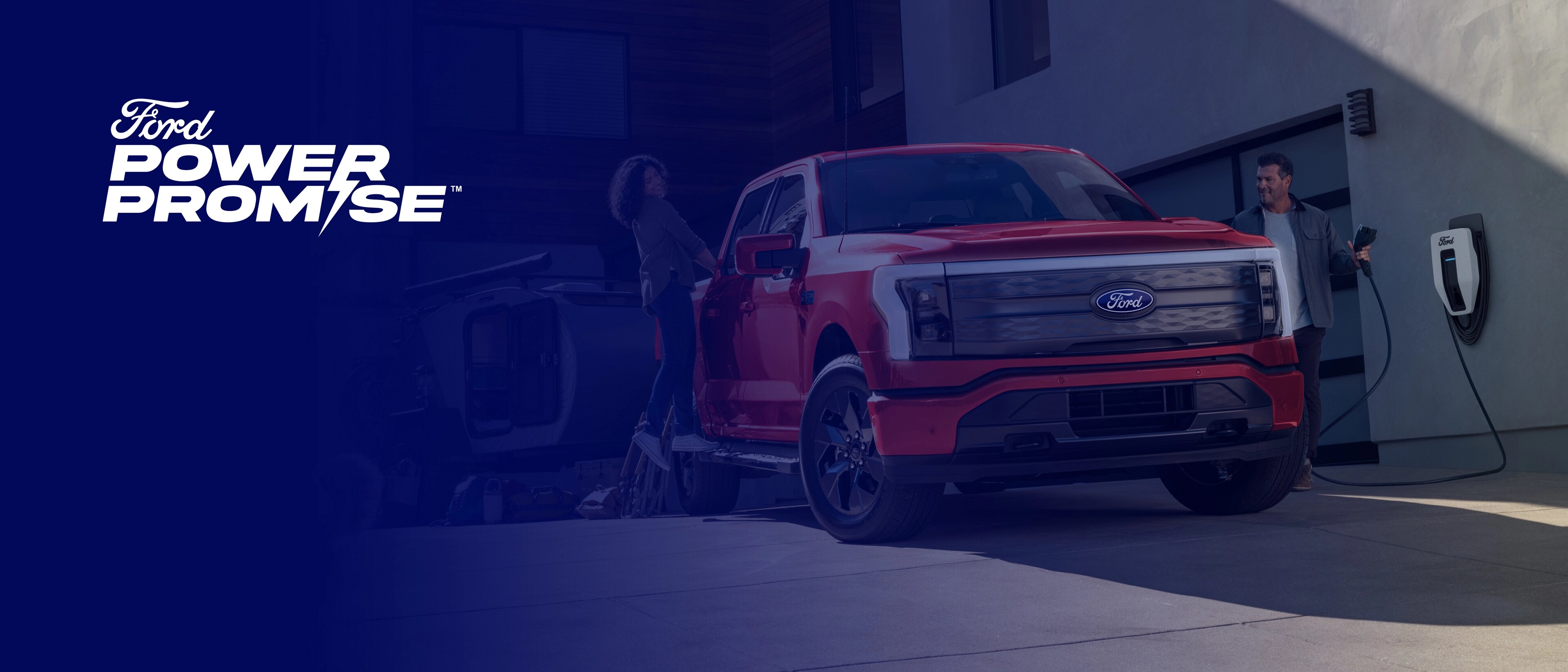 Ford Power Promise logo on a blue transparent overlay of a Ford F-150® Lightning® truck