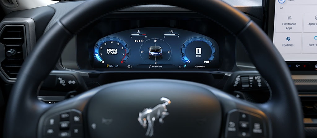 2026 Ford Bronco Sport® interior showing the instrument cluster, steering wheel and center console screen