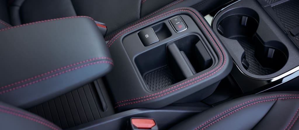 2025 Ford Mustang Mach-E® overhead shot showing vehicle interior in gray and red