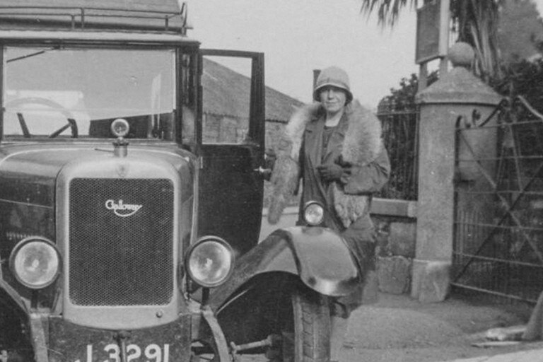 We see a black and white portrait of auto innovator Dorothée Pullinger.