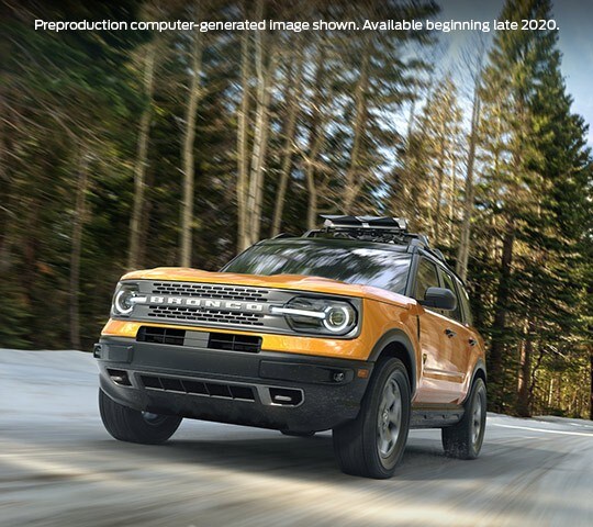 A 2021 Ford Bronco Sport being driven on a wooded road 