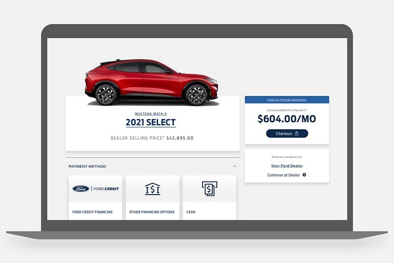 2021 Ford Mustang Mach E in online cart on a laptop