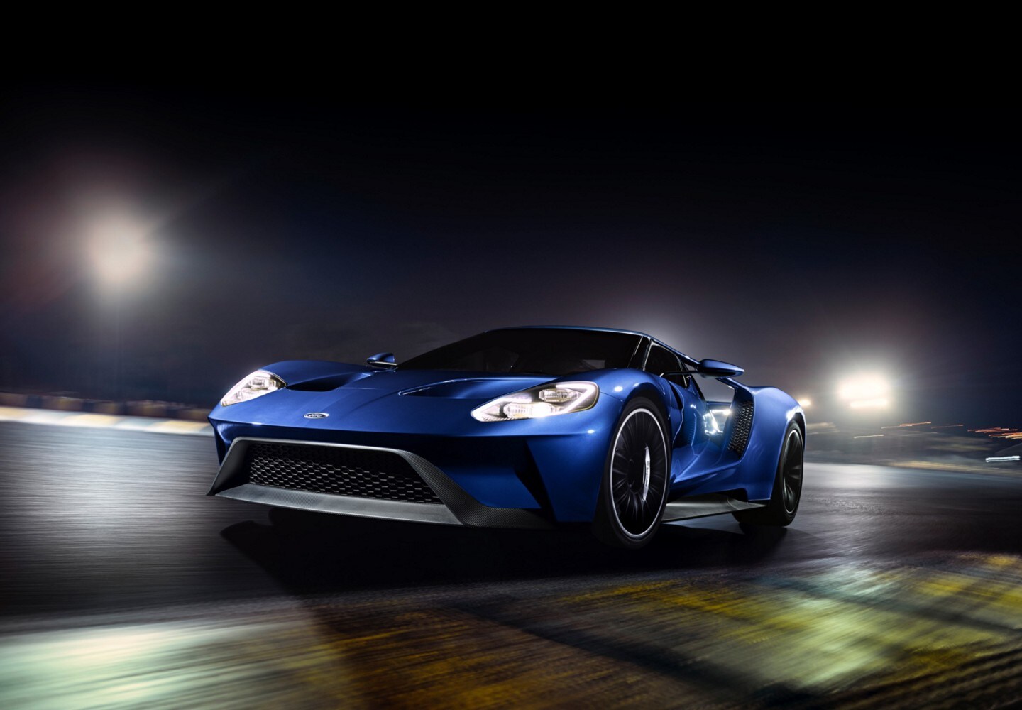 Ford G T on racetrack at night