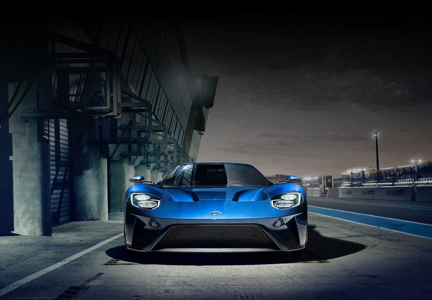 Ford G T on racetrack at night with doors closed