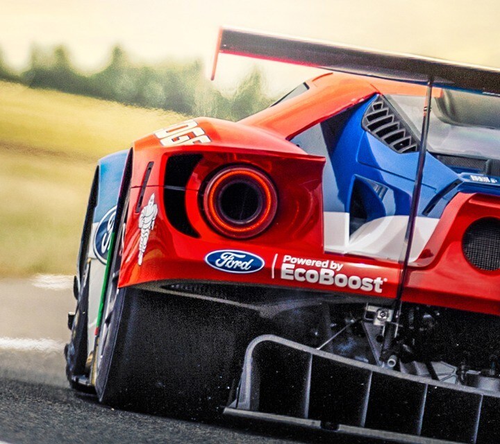 Rear shot of Ford G T on racetrack