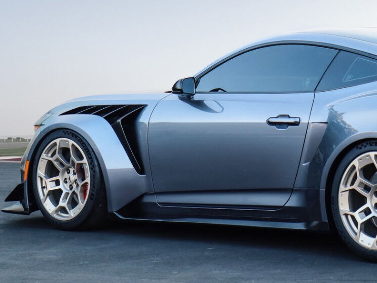 Side profile of a 2025 Mustang® GTD parked on a closed course