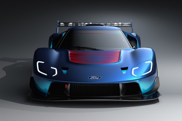 A blue 2023 Ford GT Mark Four seen from a direct front view