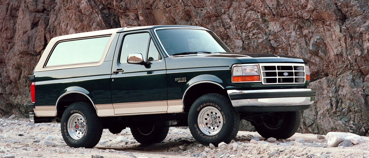 1993 Ford Bronco parked on a rocky trail 