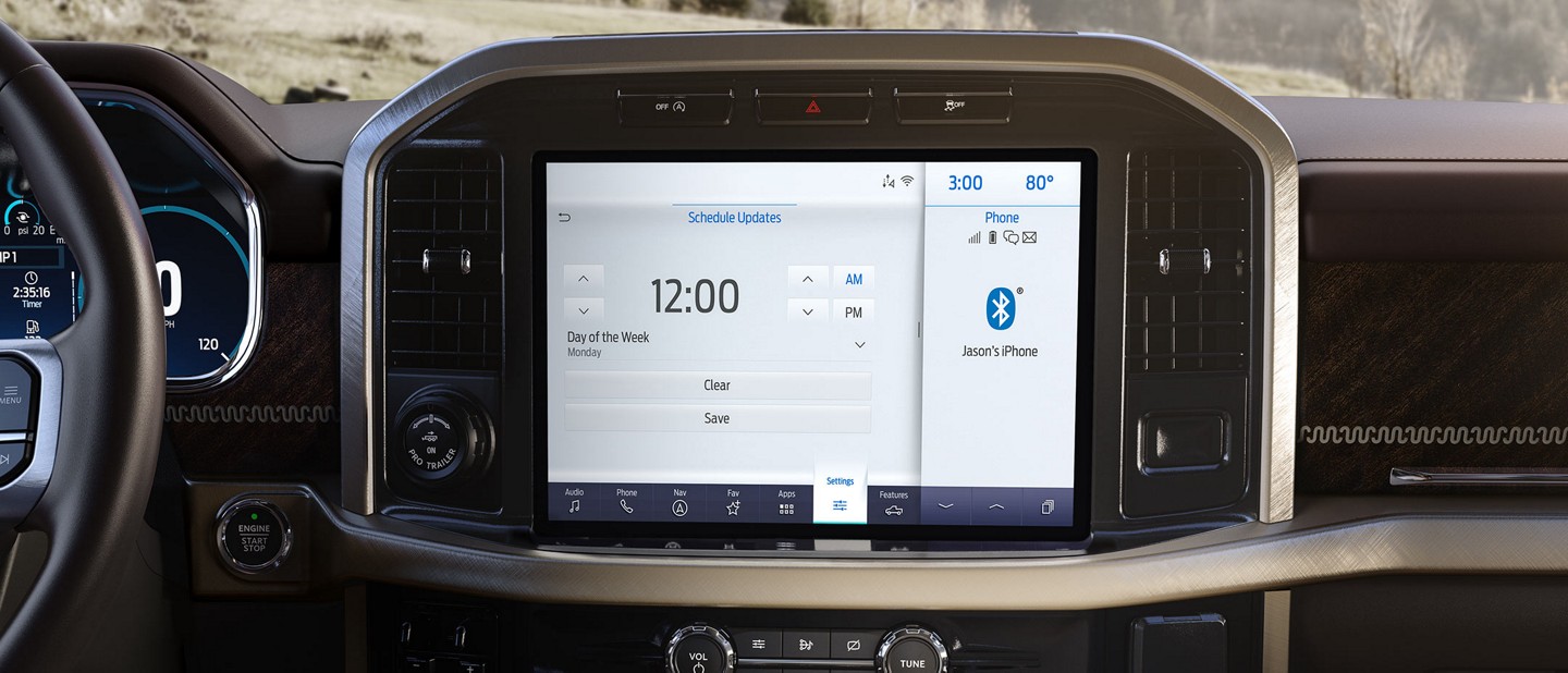 Available touchscreen displaying the available SYNC 4 system receiving a wireless update