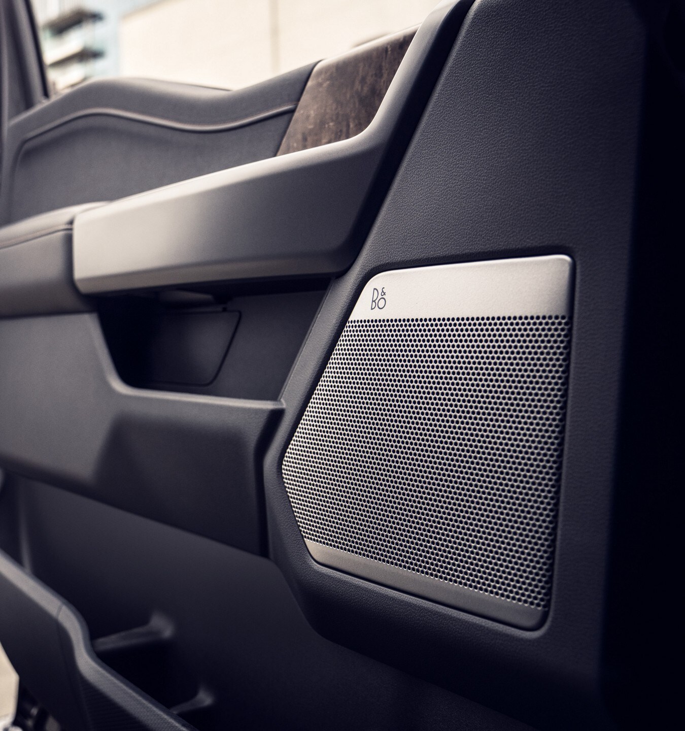 Close-up of a Bang & Olufsen speaker in the interior door of a 2022 F-150 Lightning.