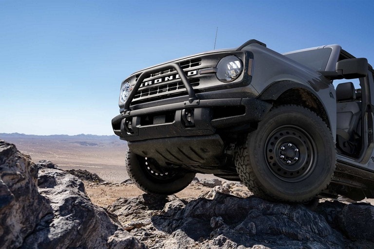 2023 Ford Bronco® Black Diamond® in Carbonized Gray Metallic with underbody bash plates shown