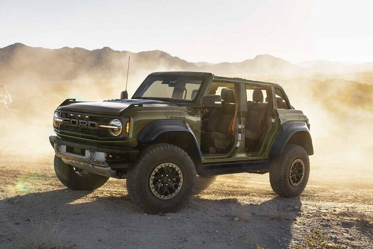 2024 Ford Bronco® in Shelter Green parked in a desert