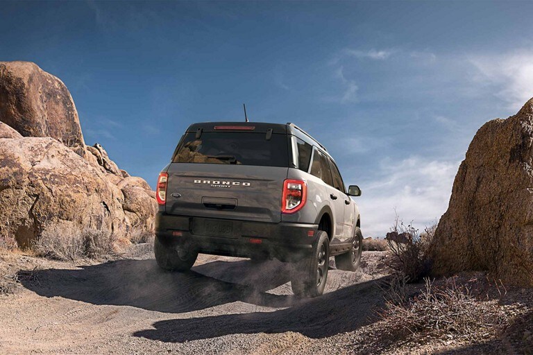 Shown is the back of the 2023 Ford Bronco® Sport model near some rocky terrain