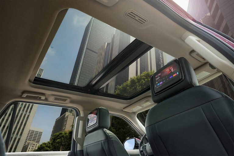 View from the inside looking out through the panoramic Vista Roof® on 2024 Ford Expedition