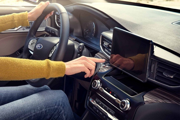2023 Ford Explorer® SUV interior with person pressing the push-button start