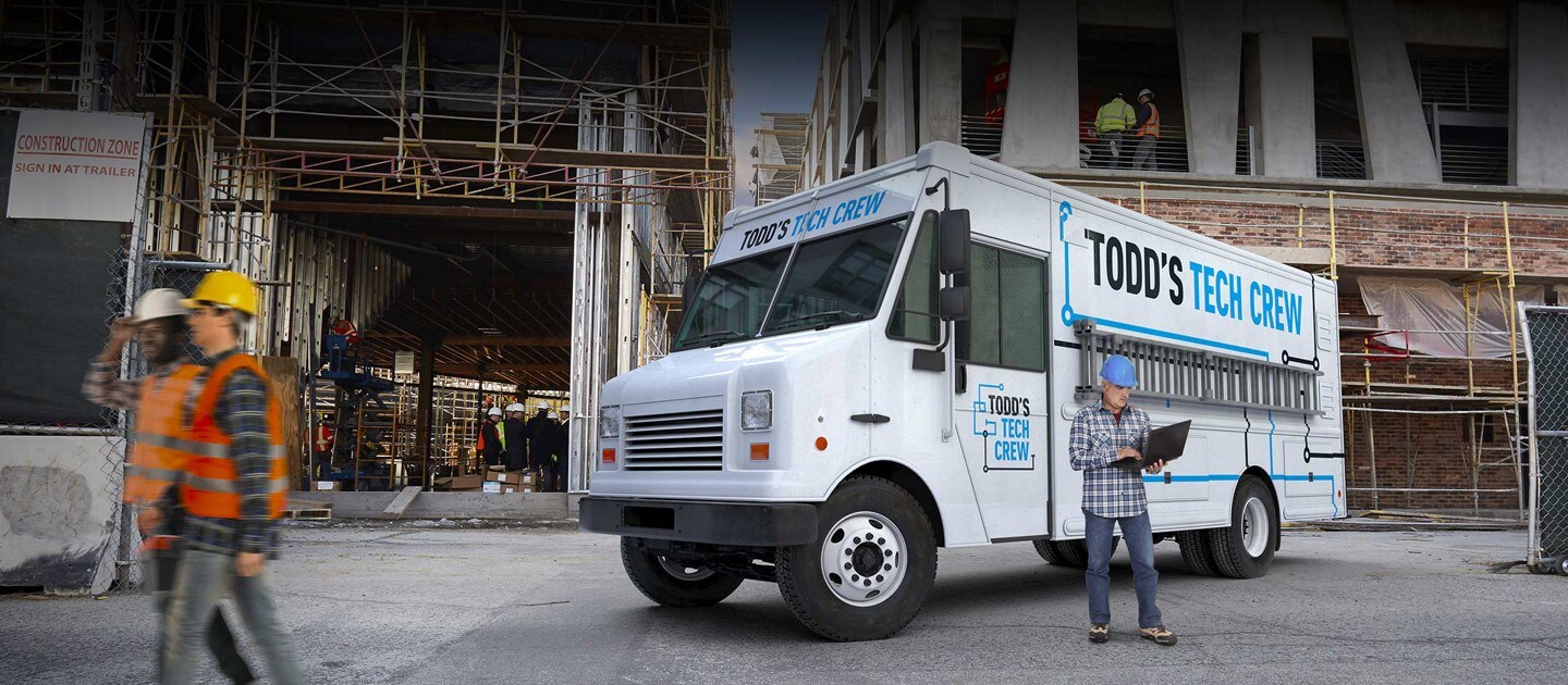 A commercial delivery van at a construction site