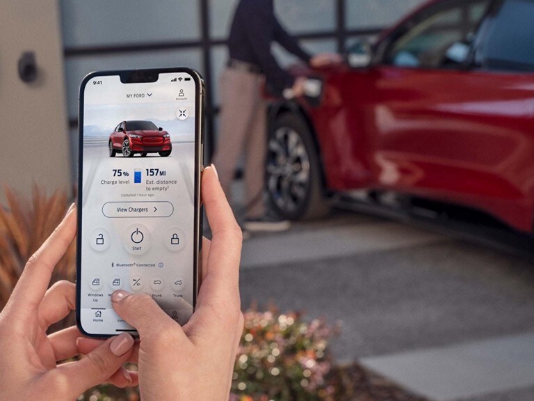 FordPass® Home Screen with Red 2023 Ford Mustang Mach-E in background