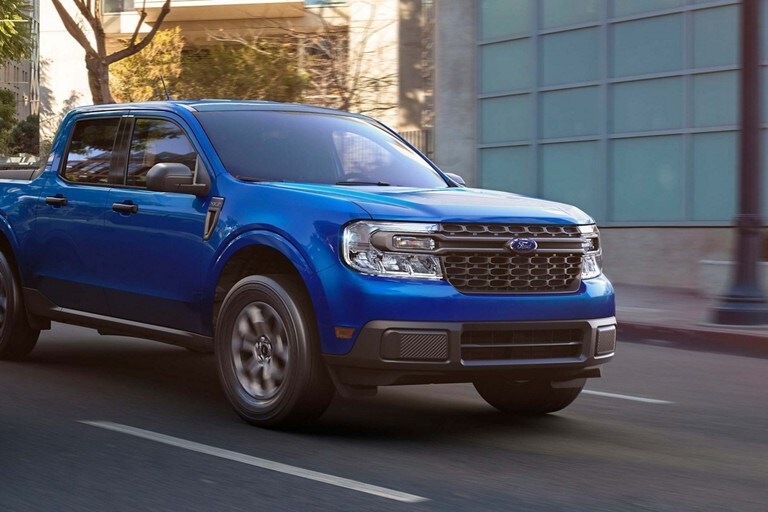 2023 Ford Maverick® truck being driven down the street