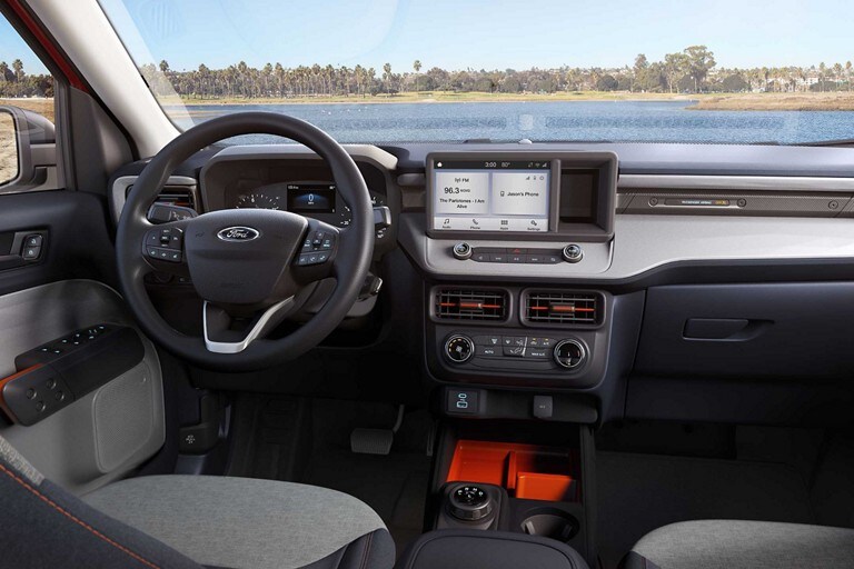 A 2024 Ford Maverick® XLT close-up of the interior steering wheel and dash