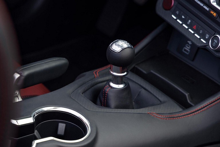 2024 Ford Mustang® interior and shifter with available Carmine Red accent stitching