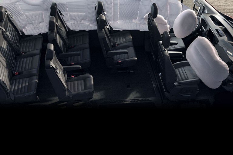 Shot of the interior of a 2023 Ford Transit® van with airbags deployed