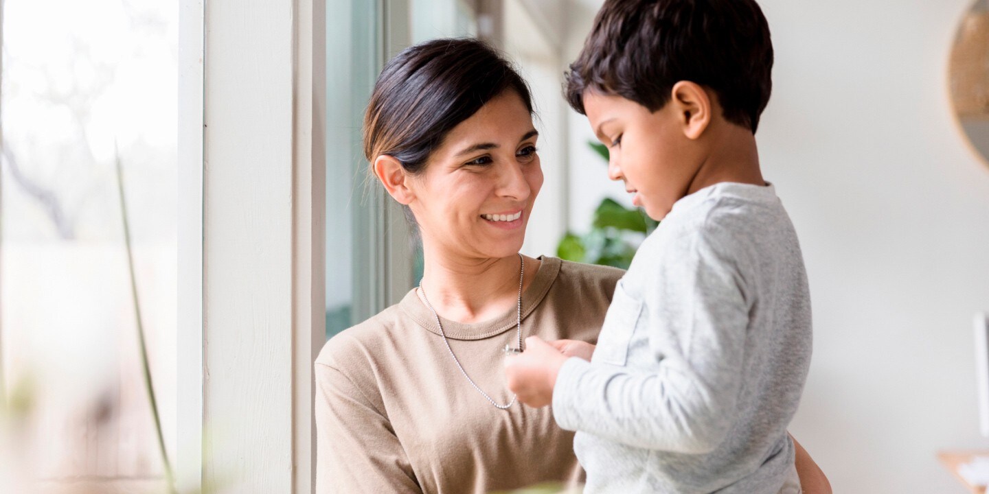 Woman looking at her child