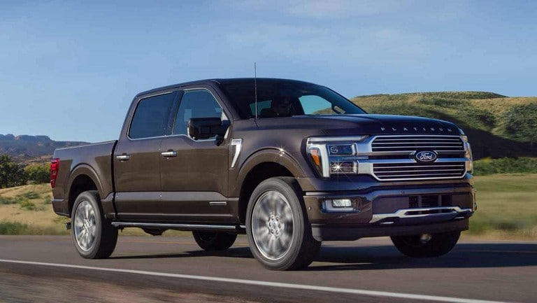 An F-150® hybrid being driven on a highway