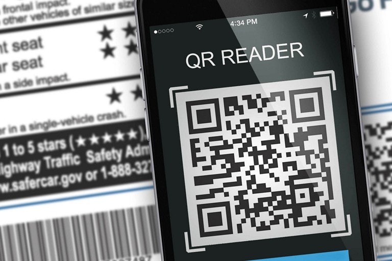 Mobile phone scan display of your Ford QR code.