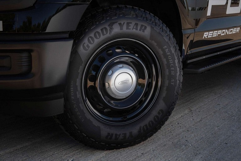 Close-up of the police-specialized steel wheels with pursuit-rated all-terrain tires on the 2024 Ford F-150® Police Responder