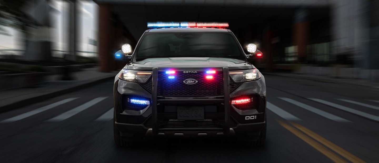 The 2025 Ford Police Interceptor® Utility being driven in an urban environment
