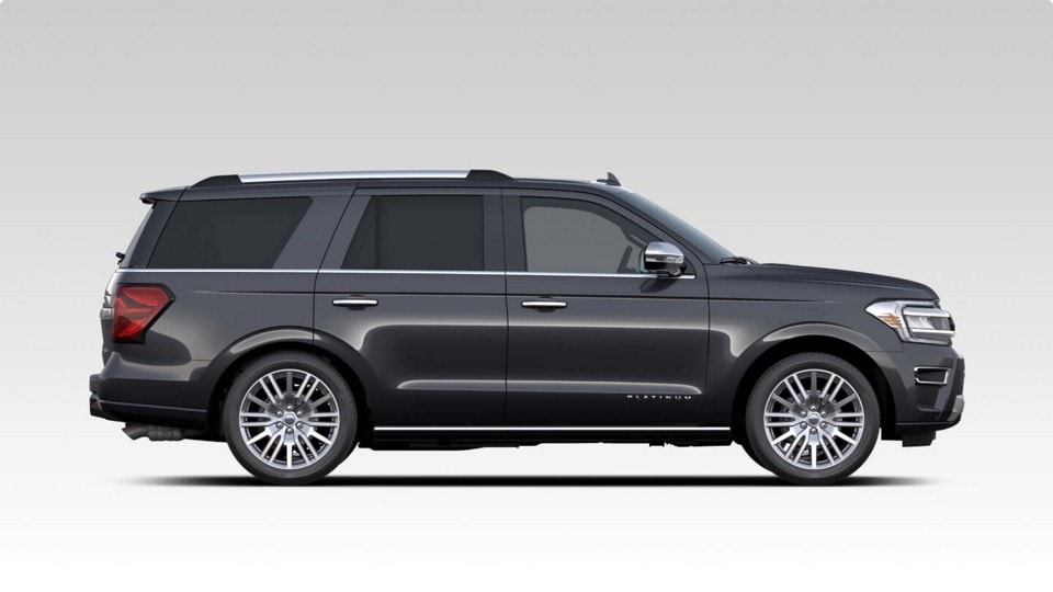 Photo illustration of the side view of a black 2024 Ford Expedition® Platinum SUV.