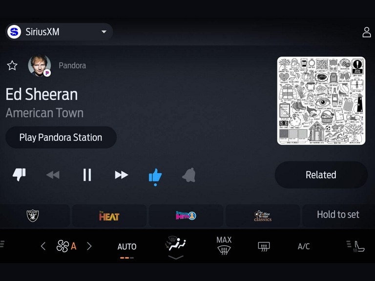 SiriusXM black in-vehicle technology screen with musical artist information displayed.