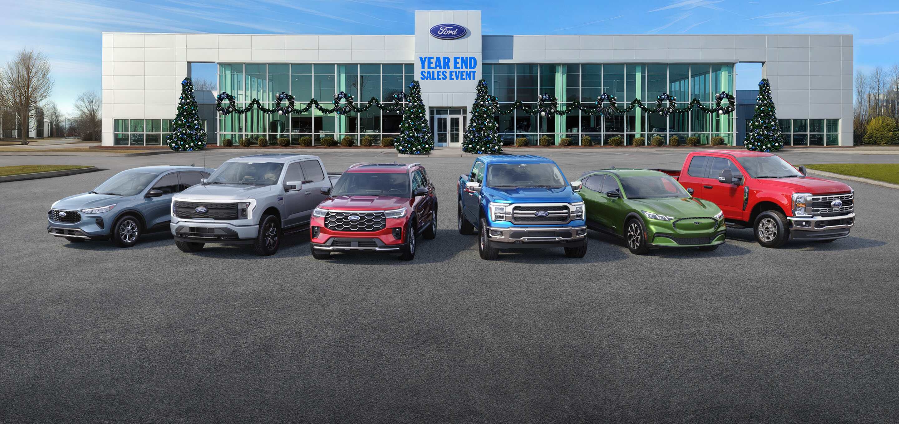 Six Ford Vehicles displayed in front of Year End Sales Event showroom
