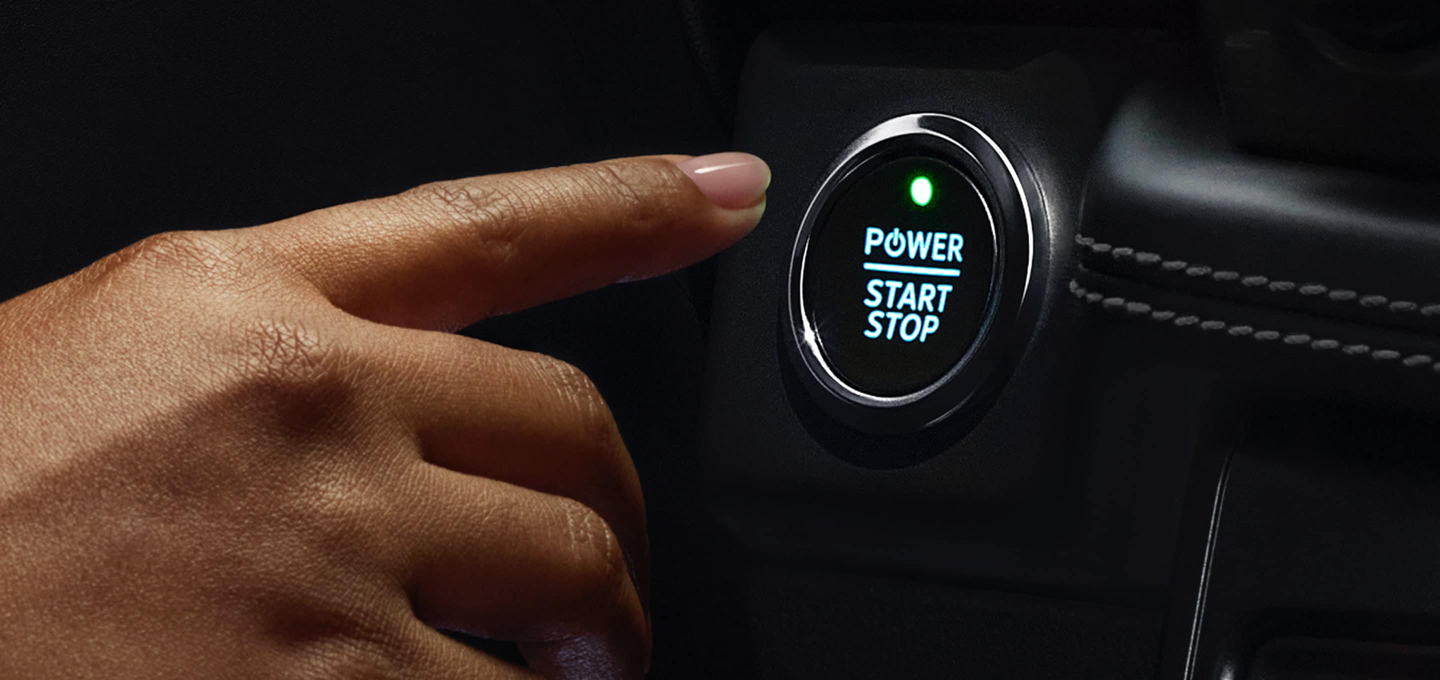 A driver starting an electric Ford vehicle