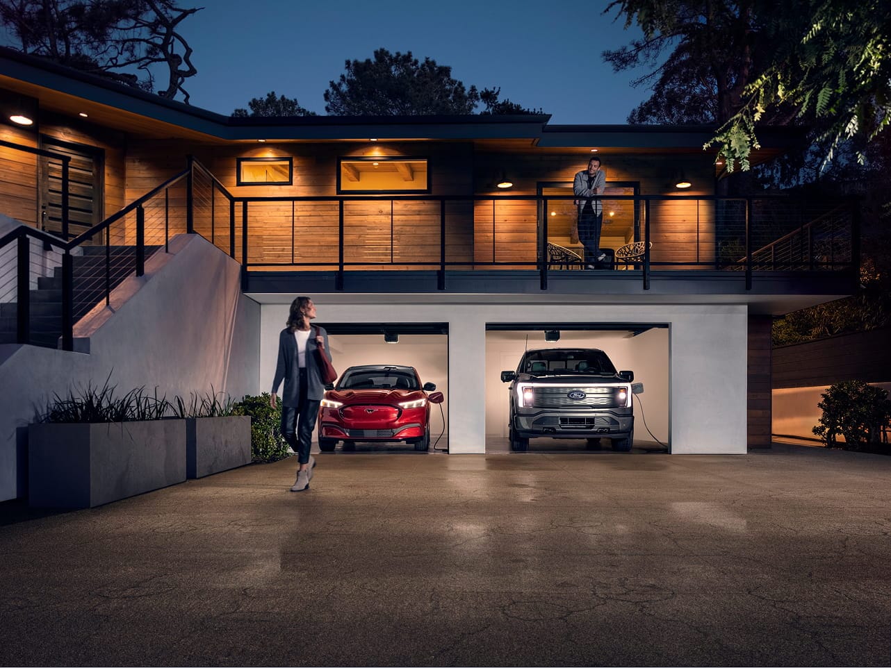Ford vehicles parked inside of a garage.