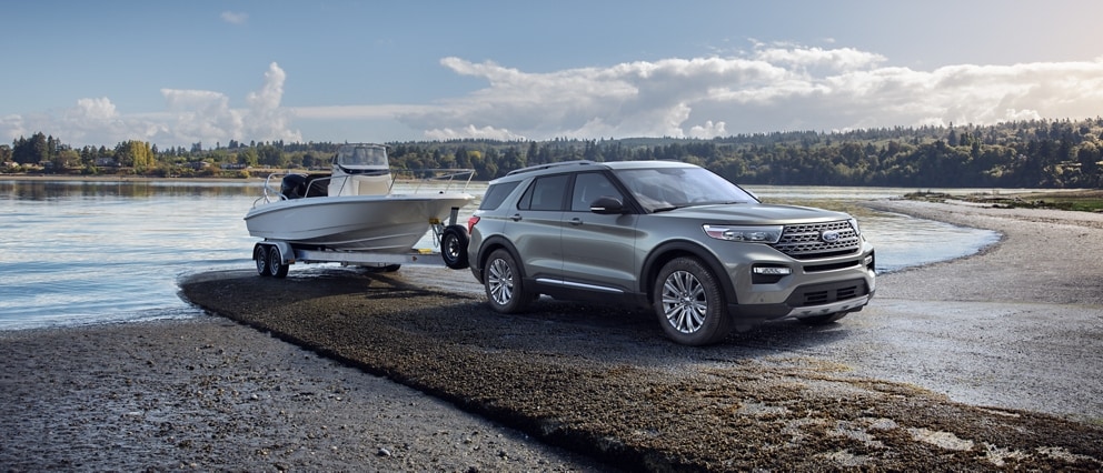 A 2020 Ford Explorer in magnetic towing a boat