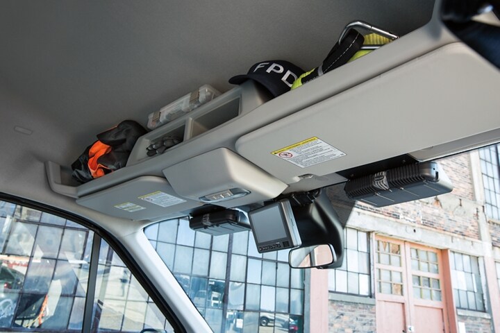 Overhead storage compartments in the twenty twenty ford transit prisoner transport vehicle 