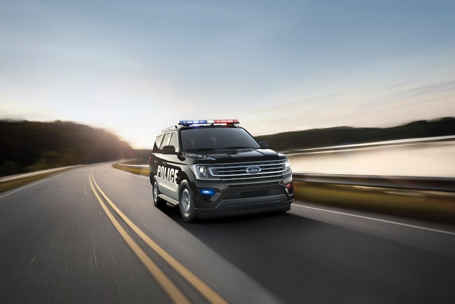 The twenty twenty one ford expedition special service vehicle on the road.