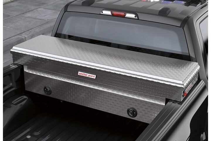 A cargo box in the bed of a twenty twenty one ford f one fifty special service vehicle