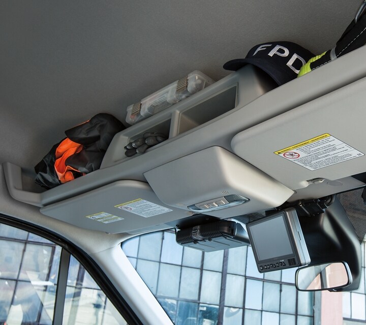 Overhead storage compartments in the twenty twenty ford transit prisoner transport vehicle 