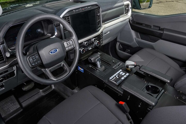 2023 Ford F-150®️ Lightning™️ Pro SSV front row seats and IP panel top tray for equipment mounting