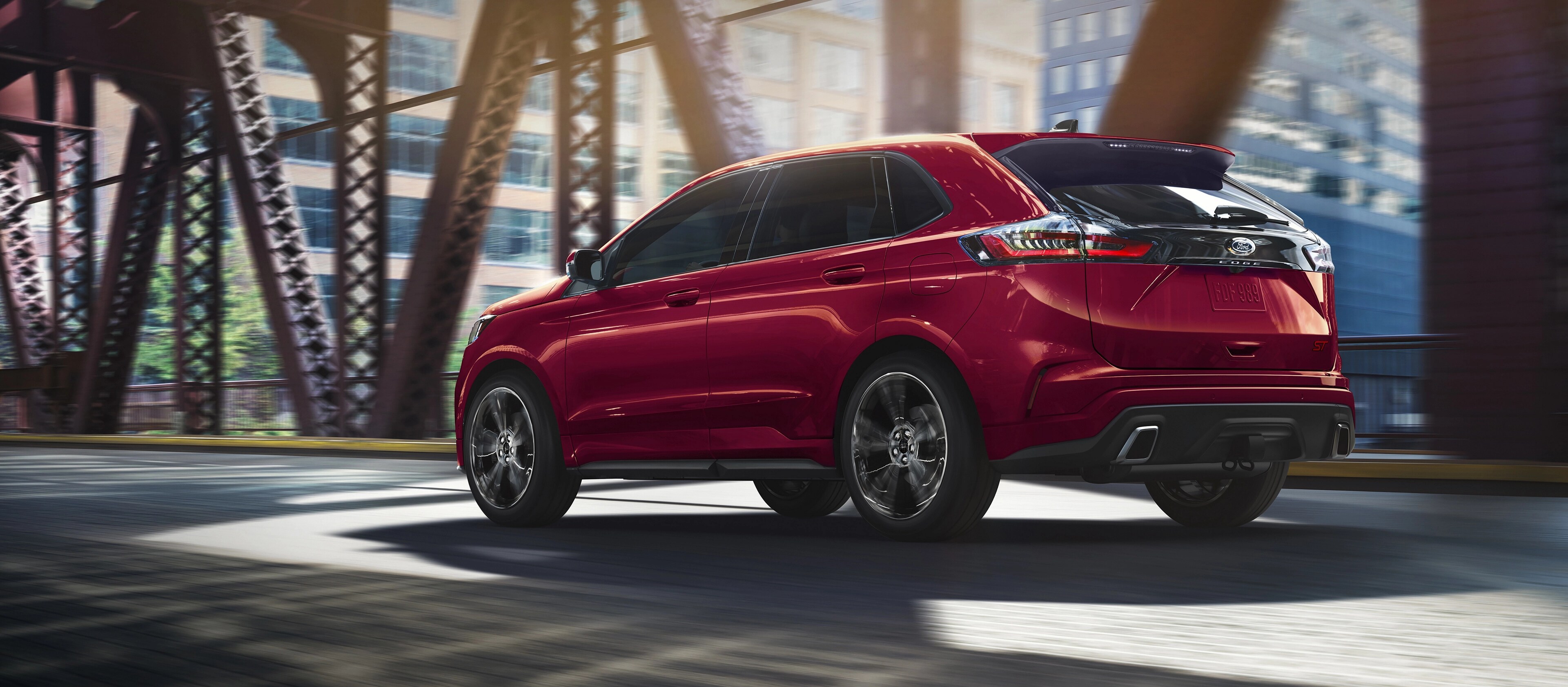 2025 Ford Edge® ST SUV being driven across a bridge