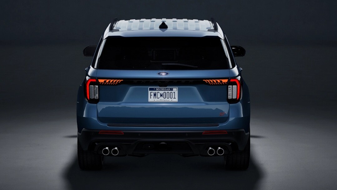 Rear end view of the Blue 2025 Ford explorer ST-line and its Power Liftgate