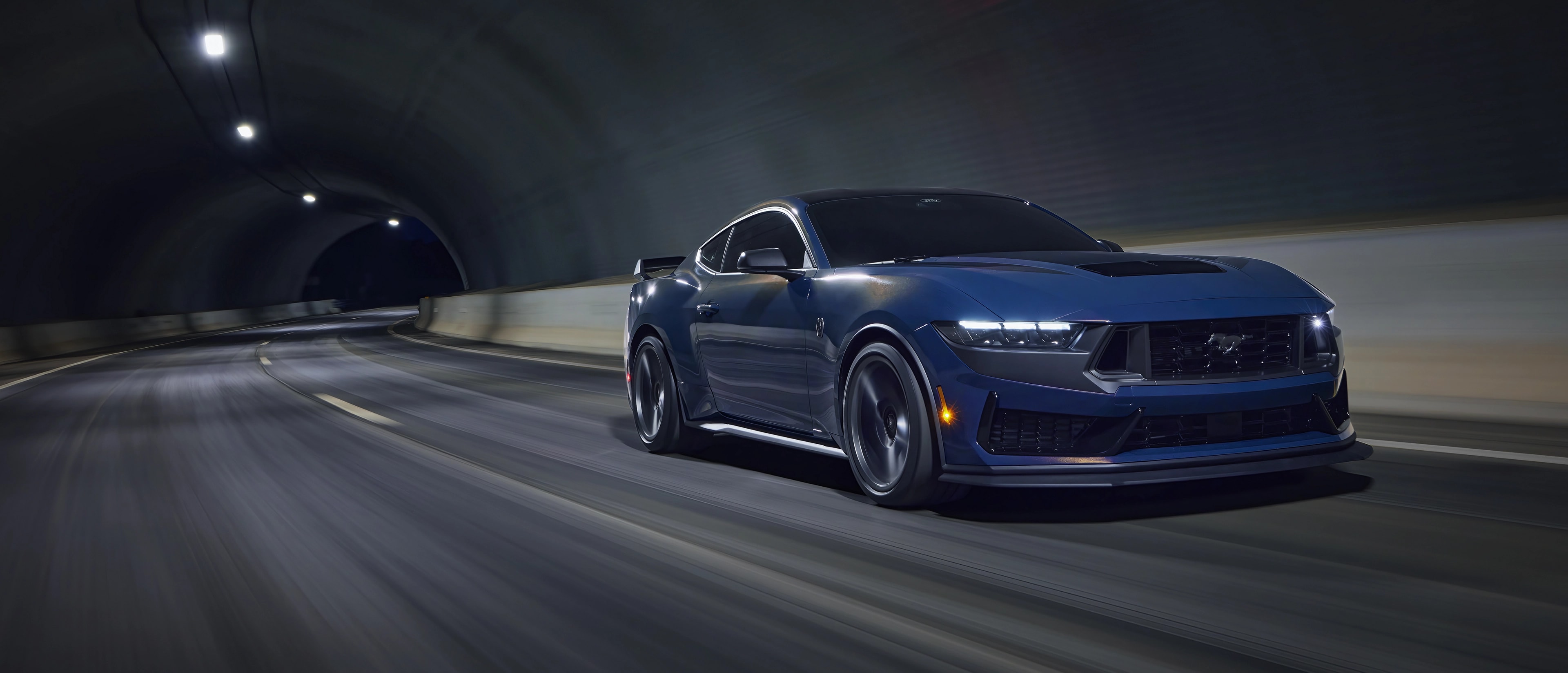 2025 Ford Mustang® Dark Horse™ being driven in a tunnel