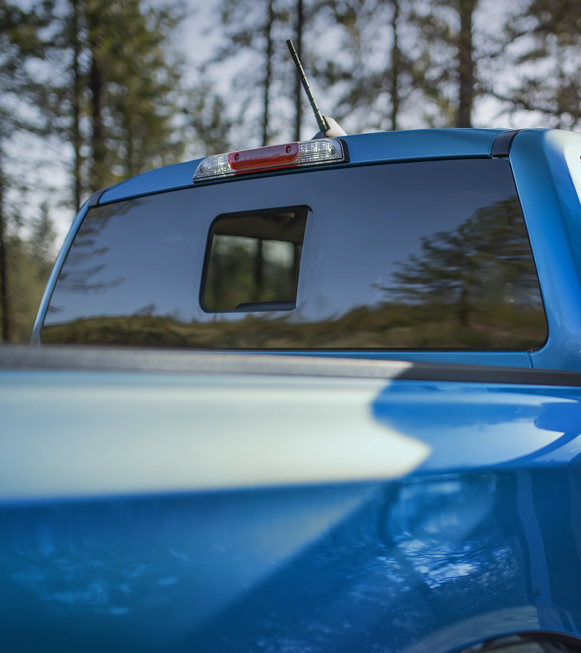 Exterior shot of the 2025 Ford Ranger® automatic rear window open