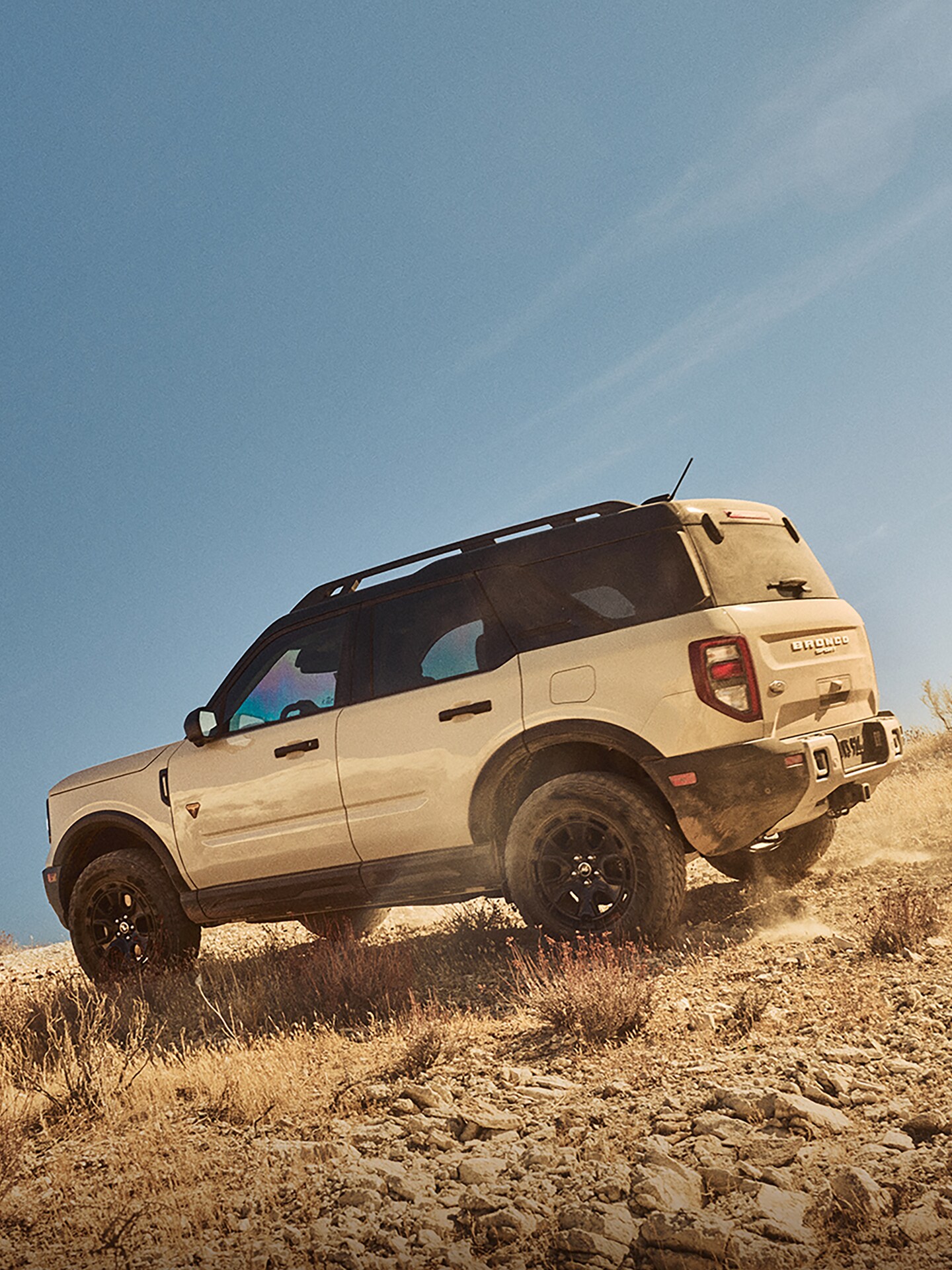 A 2025 Ford Bronco Sport® descends down a hillside trail