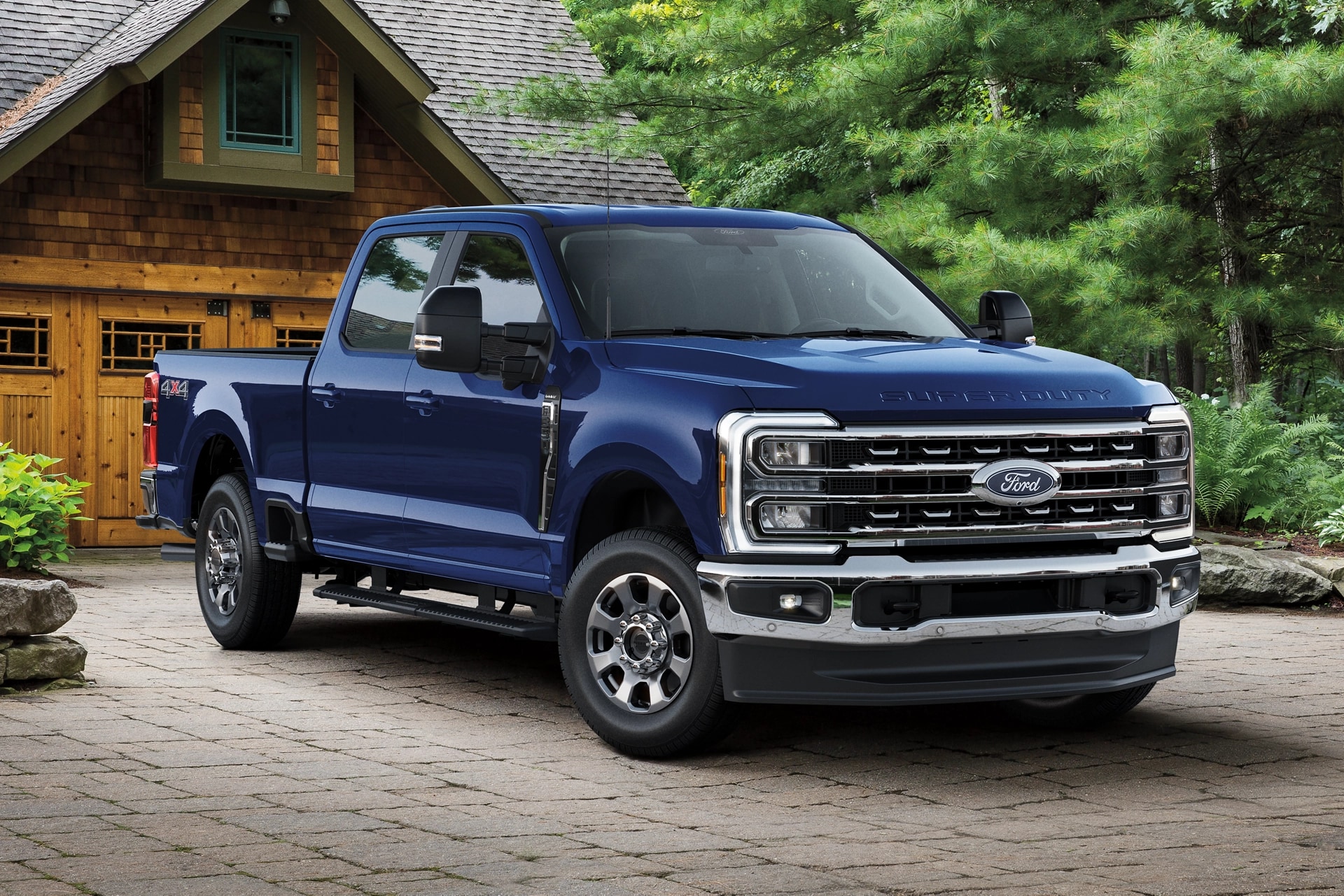 2026 Ford Super Duty® Lariat® parked in a residential driveway in front of a house