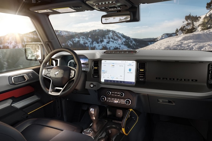 Interior of 2023 Ford Bronco® showing the available leather-wrapped steering wheel