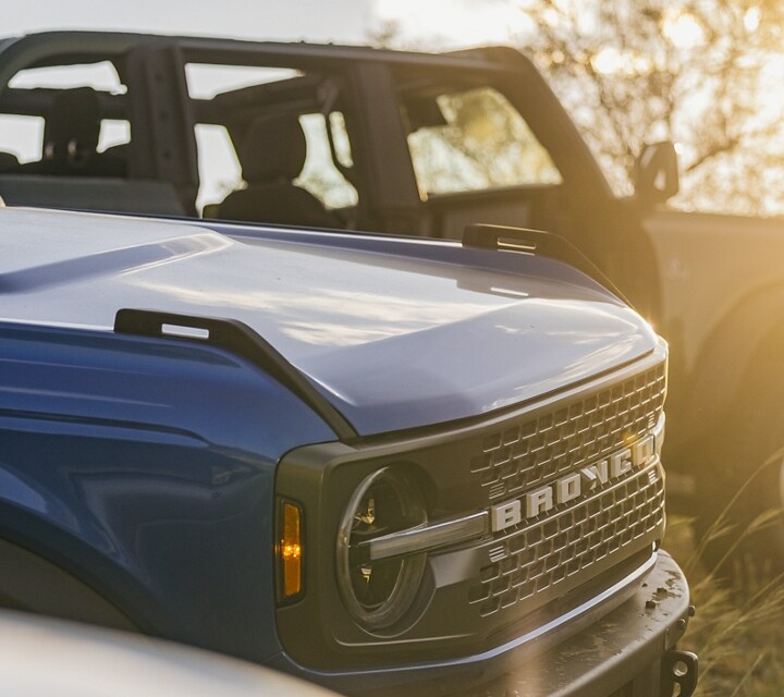 A group of 2023 Ford Bronco® SUVs parked on a hill