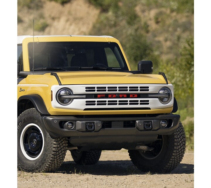Photo of a 2023 Ford Bronco® Heritage® Limited Edition in Yellowstone Metallic in the desert